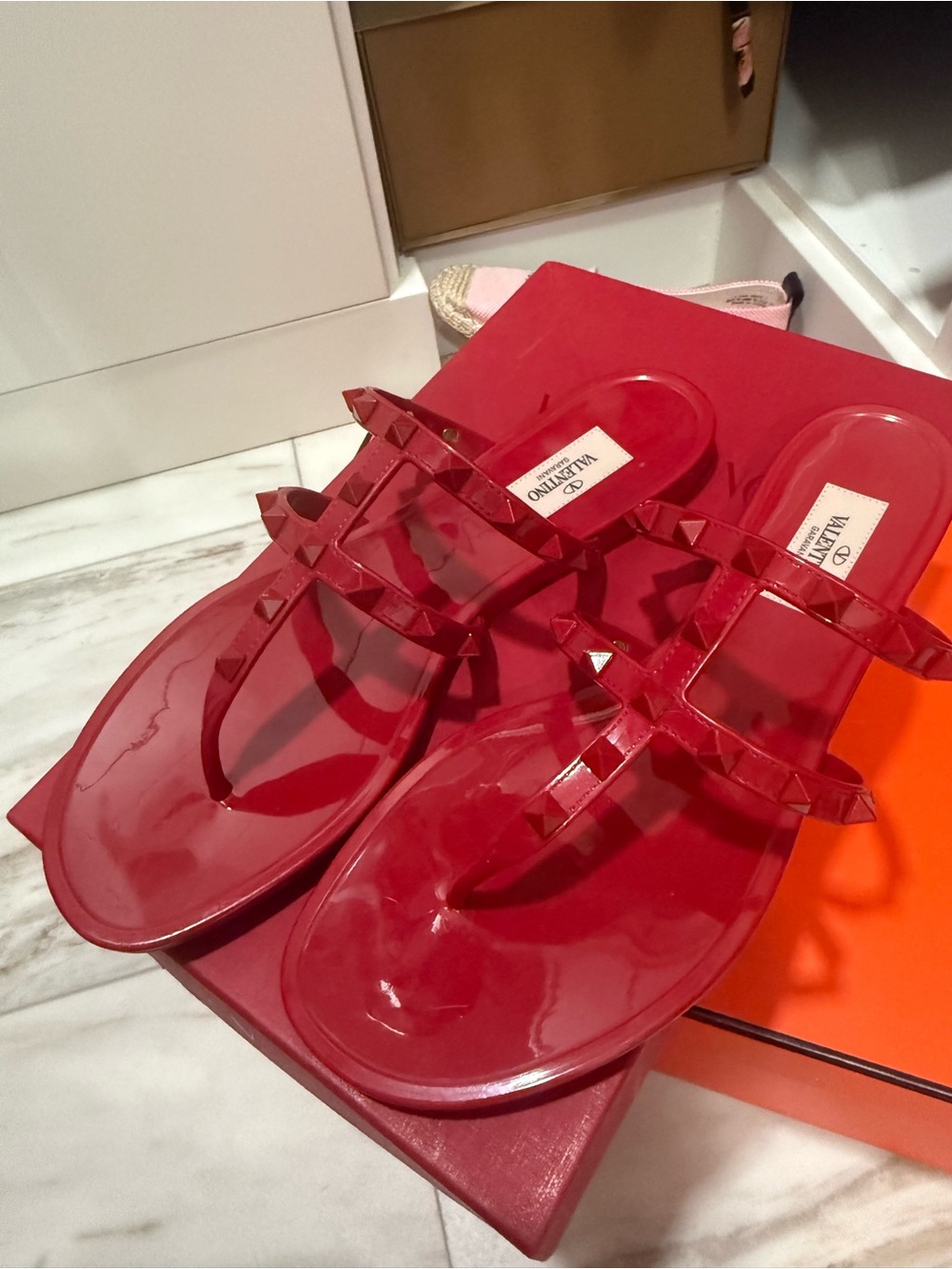 Valentino Garavani Glossy Red Rockstud Jelly Slide Sandals
